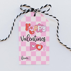 May include: A pink and white checkered gift tag with the text "Happy Valentines Day" in a colorful, playful font. The tag has a black and white twine bow and the text "from" with a heart.