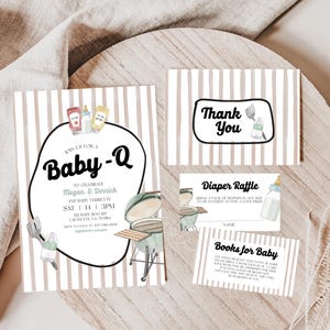 May include: Baby-Q themed invitation and inserts. The invitation features a large oval with the text "Baby-Q" and event details. Additional inserts include a thank you card, diaper raffle card, and a books for baby card. All cards have a striped background.