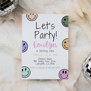 May include: A white invitation with a purple, green, and yellow smiley face design. The text reads "Let's Party!  Emilyn is turning nine February 16 at 3pm  Emilyn's House 91011 Smiley Face Drive Lafayette, La. 70506 RSVP to Monica at 555-555-5555"