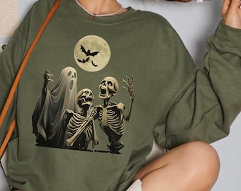 Felpa con grafica retrò horror con scheletro spettrale, maglione lunare, dolcetto o scherzetto, ghoul spettrale, top vintage horror, teschi malvagi