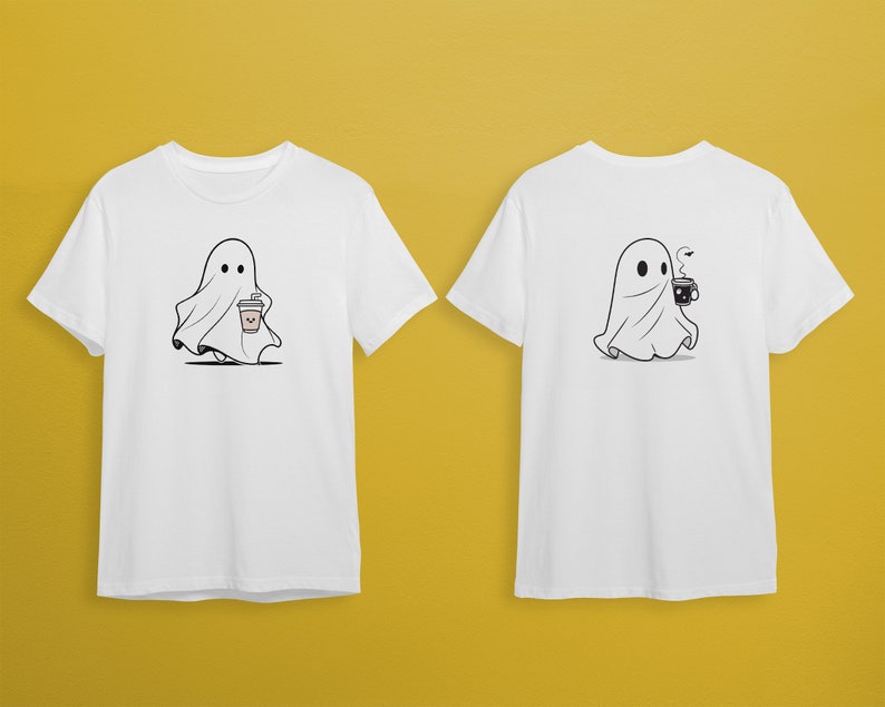 May include: Two white t-shirts with a ghost graphic. One ghost is holding a cup of coffee and the other is holding a cup of tea.