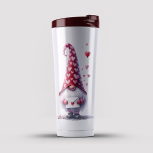 May include: A white travel mug with a red lid features a gnome with a red and white heart patterned hat holding a white envelope with a red heart. The gnome is surrounded by small red hearts.