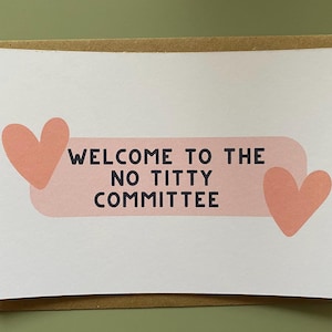 May include: A pink and white card with the text "Welcome to the No Titty Committee" and two pink hearts.