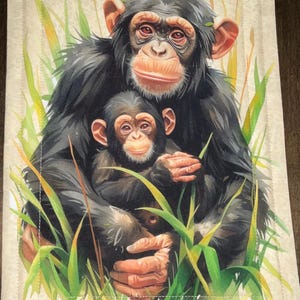 Coussinet de cocotte en coton matelassé fait main réversible. Maman chimpanzé et son bébé !