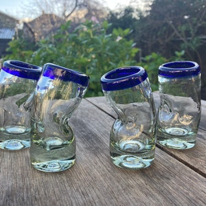 Set of 4 unique handblown shot glasses or liquor glasses