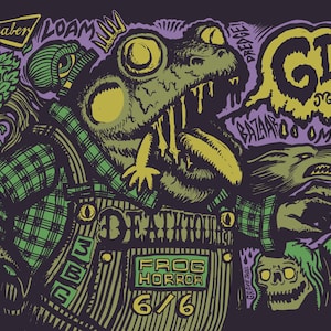 May include: A graphic print featuring a large frog creature wearing plaid overalls, with text including "Gitrog Monster," "Frog Horror," "6/6," "Goldsaber," "Loam," "Bazaar," "Omongrel," and "Deathtouch" against a dark purple background with skulls.