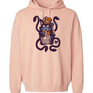 May include: A pink hooded sweatshirt with a black and blue illustration of a cat with multiple arms holding a cassette tape. The cat has a third eye and a crown on its head.
