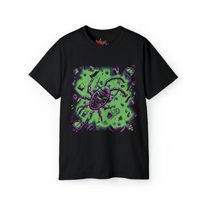 May include: Black t-shirt with a green and purple graphic print of a spider with a skull-like face surrounded by various objects.