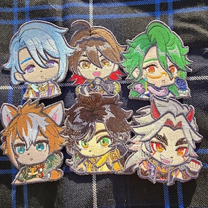 May include: Six embroidered patches featuring anime-style characters with colorful clothing and hair. The characters have different expressions and are set against a plaid background.