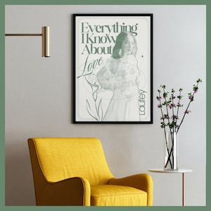 A green and white poster of Laufey. A singer songwriter. It includes her album. Everything I know about love. It has a minimalist aesthetic with an illustration of a flower. Her name is printed next to her in a modern font. It is a digital download.