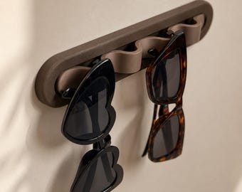 Support magnétique pour lunettes de soleil