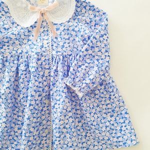 Blue Floral Baby Girl Dress with Lace Collar and Bow – Long Sleeve Cotton Dress