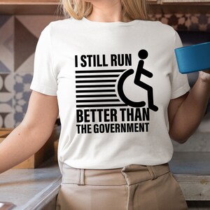 Wheelchair Shirt, Wheelchair Humor, Funny Wheelchair Shirt, I Still Run Better Than The Government, Handicap Shirt, Wheelchair Gifts