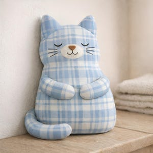 blue plush cat toy, soft stuffed animal, nursery decor idea