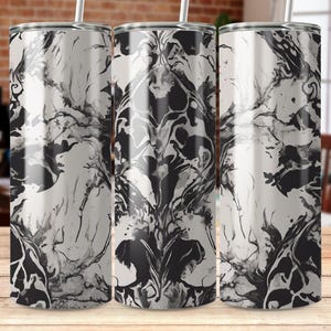 May include: Three stainless steel tumblers with a black and white marbled design. The tumblers are all the same size and shape.