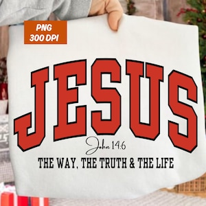 May include: White fabric with the word "JESUS" in large red block letters, outlined in black. Below, the text "John 14:6" and "THE WAY, THE TRUTH & THE LIFE" are printed in black. The image also includes a "PNG 300 DPI" label.