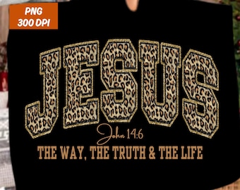 May include: Black t-shirt with the word "JESUS" in a leopard print design with gold glitter trim. The text "John 14:6" and "THE WAY, THE TRUTH & THE LIFE" are printed below in a brown font.