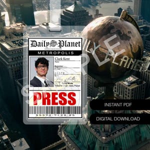 May include: A Daily Planet press ID badge featuring the name "Clark Kent" and a photo. The badge includes the text "PRESS" in red, a barcode, and the words "INSTANT PDF" and "DIGITAL DOWNLOAD". The background shows a cityscape.