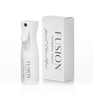 May include: White spray bottle with a black nozzle and a white label that says "Fusion Mineral Paint paint it beautiful".