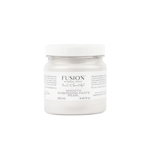 May include: A white jar of Fusion Mineral Paint Smooth Embossing Paste in Pearl. The jar is labeled with the product name, size (8.45 fl oz / 250 ml), and the Fusion Mineral Paint logo.