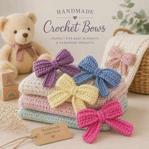 May include: A collection of handmade crochet bows in purple, blue, yellow, and pink, resting on a stack of folded blankets. A tan teddy bear sits nearby, and a brown paper tag with the text Handmade with love is visible in the foreground.