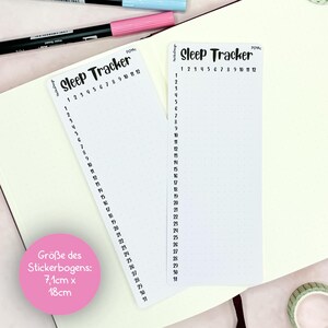 May include: Two white printable sleep tracker stickers with black text and numbers. The stickers are 7.1 inches by 18 inches.
