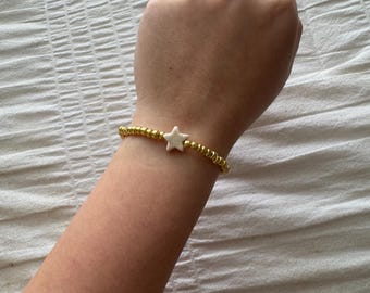Gold seed bead bracelet with star charm