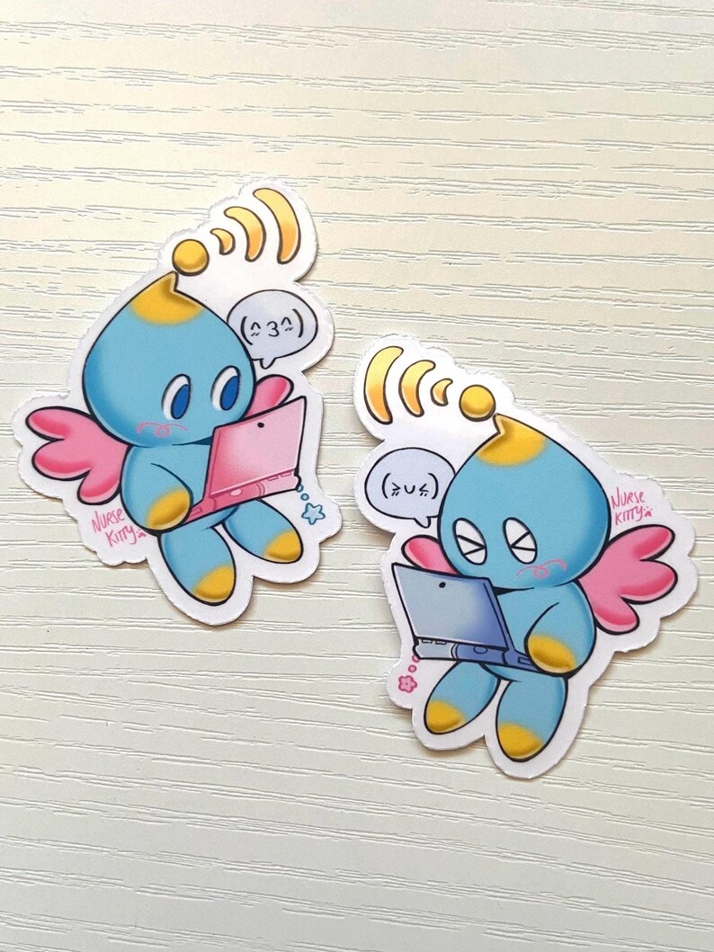 May include: Two stickers featuring a blue cartoon character with yellow accents, pink wings, and a laptop. The character has a speech bubble with text and is surrounded by wireless signal lines. The text "Nurse Kitty" is written on the sticker.