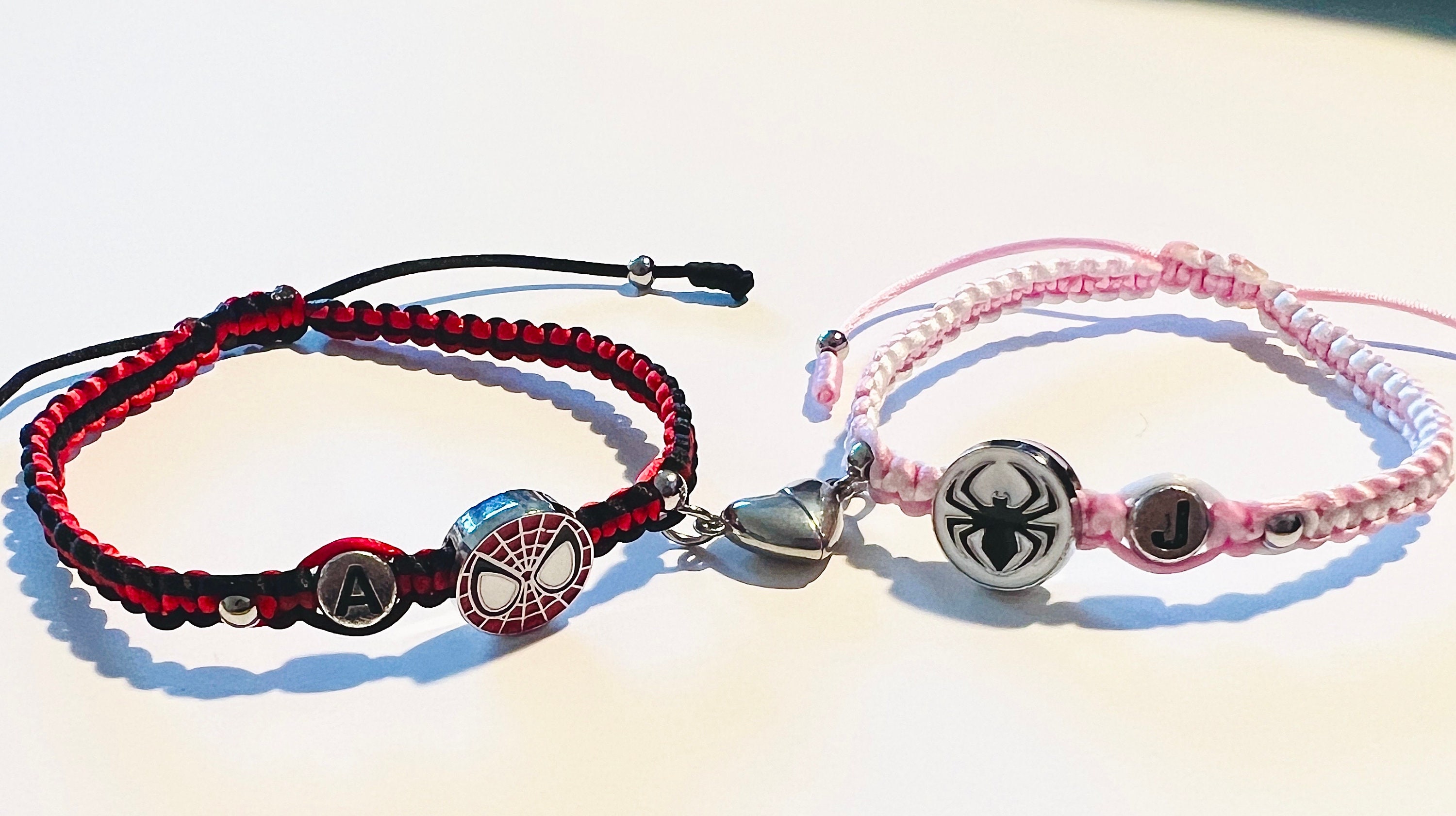WITH 🩷, MG on Instagram: Spider-Kitty x Spider-Man matching bracelets  🕷️🕸️ •Send this to them 🎀🕸️ Small silver beads on each side of the  charms will not be included! (MAGNETIC HEART WILL