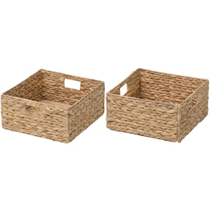 May include: Two rectangular woven storage baskets. The baskets are made of a light brown, natural material and feature built-in handles on the sides. The baskets are empty and suitable for organizing items in a home or office.