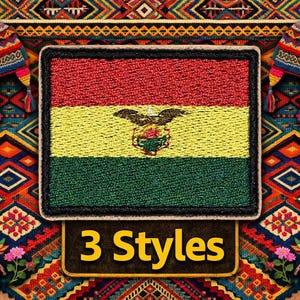 May include: A rectangular patch featuring the horizontal red, yellow, and green stripes of the Bolivian flag with a central coat of arms. The patch is set against a colorful geometric textile background with two knit hats and two dolls.