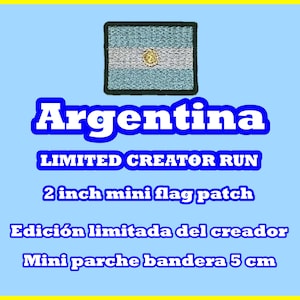 May include: A rectangular patch featuring the flag of Argentina, with light blue and white stripes and a gold sun emblem. The word "Argentina" is above the flag. Text below reads "LIMITED CREATOR RUN" and "2 inch mini flag patch."