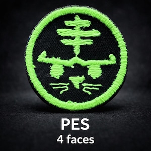 May include: A circular embroidered patch featuring a black background with a bright neon green border and a stylized neon green graphic design. The design includes a central vertical element, horizontal lines, and a small triangular shape at the bottom.