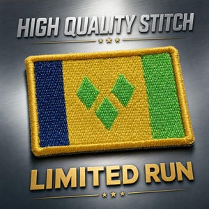 May include: Embroidered patch of the Saint Vincent and the Grenadines flag. The rectangular patch has a blue stripe, a yellow centre with three green diamonds, and a green stripe. Text at the top reads "HIGH QUALITY STITCH" and "LIMITED RUN" at the bottom.