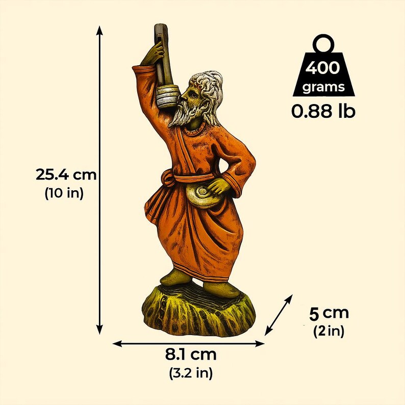 Handmade clay figurine of a Baul folk musician in an orange robe, holding a lantern and a small drum, shown with dimensions 25.4 cm (10 in) tall, 8.1 cm (3.2 in) wide, 5 cm (2 in) deep, and weighing 400 grams (0.88 lb) against a beige background.