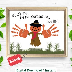 May include: A printable art print featuring a handprint scarecrow with a pumpkin head, wearing a black hat and red scarf. The text reads "Hi, it's Me I'M THE SCARECROW... It's Me!!" and "BONUS Digital Download * Instant".