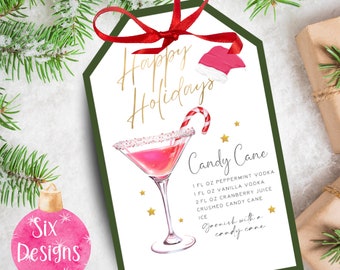 May include: A printable Christmas cocktail recipe card with a festive green border and a red ribbon. The card features a martini glass filled with a pink drink and a candy cane garnish. The text reads "Happy Holidays Candy Cane" and includes the ingredients and instructions for making the cocktail.