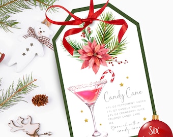 May include: A green gift tag with a red ribbon and a watercolor illustration of a poinsettia and pine branches. The tag has a recipe for a Candy Cane cocktail with peppermint vodka, vanilla vodka, cranberry juice, crushed candy cane, and ice.