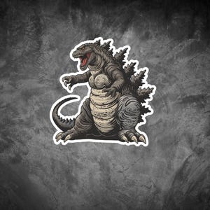 May include: A sticker featuring a detailed illustration of Godzilla, a fictional giant monster. The artwork depicts Godzilla in a dynamic pose, with a gray and beige color scheme, and a red mouth. The sticker has a white border.