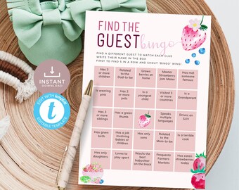 May include: A pink and white printable bingo card with the title "Find the Guest Bingo". The card has a strawberry graphic and is designed for a baby shower or gender reveal party.