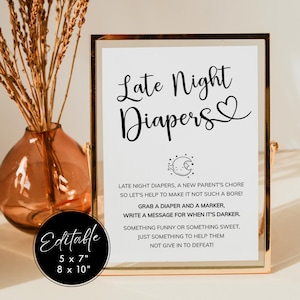 May include: A printable sign for a baby shower or party, with the text "Late Night Diapers". The sign is in a gold frame and has a black and white illustration of a crescent moon and a star. The text on the sign reads: "Late night diapers, a new parent's chore so let's help to make it not such a bore! Grab a diaper and a marker, write a message for when it's darker. Something funny or something sweet, just something to help them not give in to defeat!"