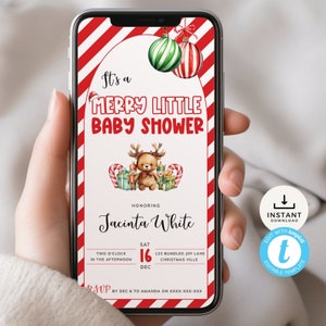 Może przedstawiać: Smartfon wyświetla zaproszenie na baby shower w świątecznym klimacie. Projekt zawiera czerwono-białe paski, świąteczne ozdoby i tekst "It's a Merry Little Baby Shower". Zaproszenie zawiera szczegóły baby shower Jacinty White.