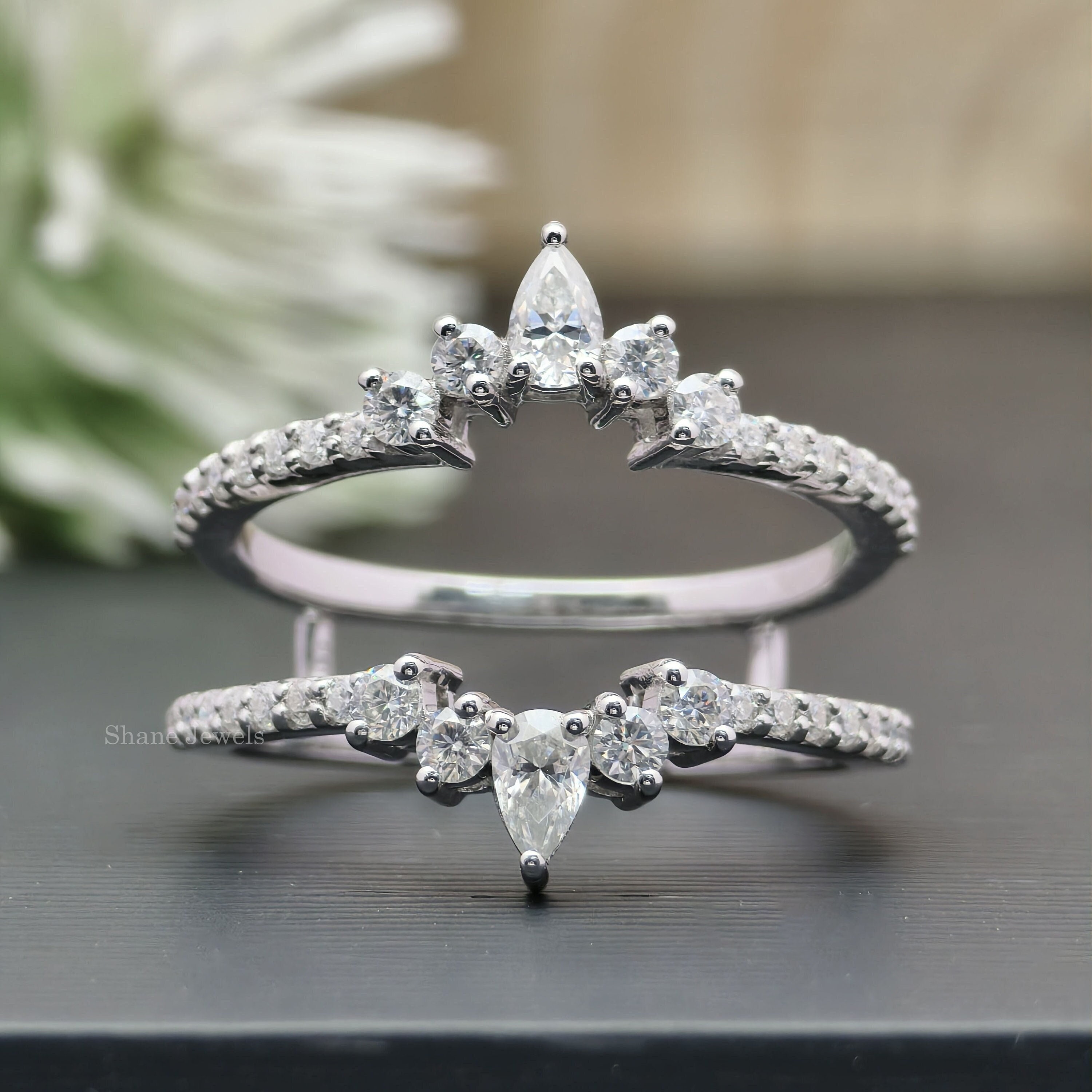 Curved wedding band for oval ring deals