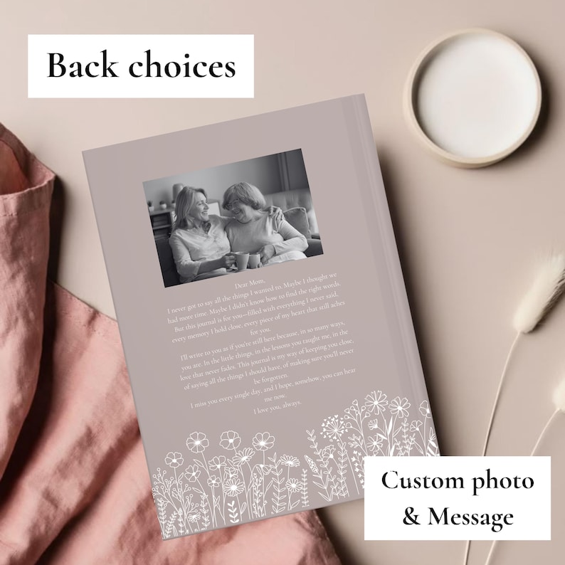 May include: A personalized journal with a custom photo and message. The cover is a muted mauve color, with a black and white photo of two women. The text "Back choices" is at the top, and "Custom photo & Message" is at the bottom.