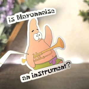 May include: A sticker featuring a cartoon character playing a trumpet with the text "is Mayonnaise an instrument?"