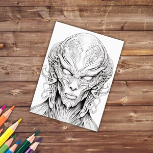May include: A black and white line drawing of a detailed, intricate, and futuristic face with a mechanical design.
