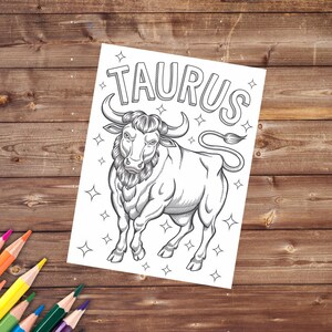 May include: A black and white line drawing of a bull with the word "TAURUS" in large letters above it. The bull is surrounded by small stars.