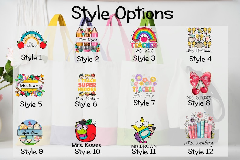 May include: Twelve white tote bags are displayed, each featuring a unique design with text and illustrations. Designs include rainbows, pencils, and apples. Each bag has a different style number and handle colour.