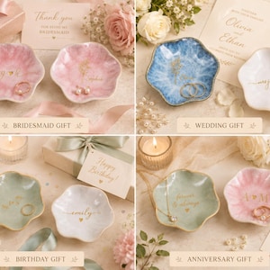 May include: A collection of flower-shaped trinket dishes in various colors including pink, blue, white, and sage green. Each dish features gold-colored custom text or initials, such as G H, Sophia, Olivia and Ethan, msjohnson, emily, and A M.