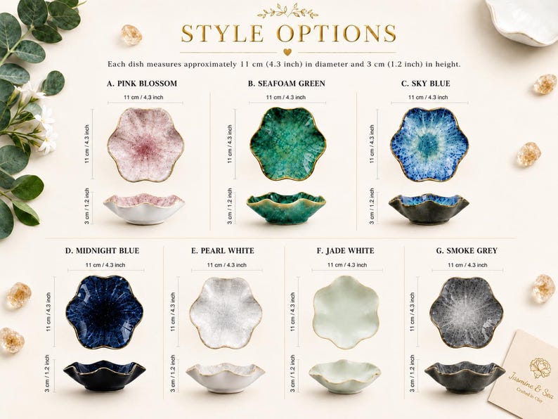 May include: A collection of seven flower-shaped ceramic dishes labeled Style Options, each measuring 4.3 inches in diameter and 1.2 inches in height. The dishes come in pink blossom, seafoam green, sky blue, midnight blue, pearl white, jade white, and smoke grey.
